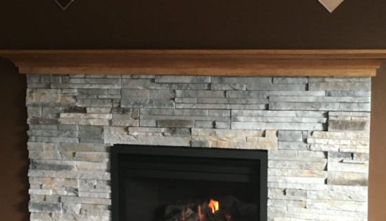Living Room Warmth stone fireplace