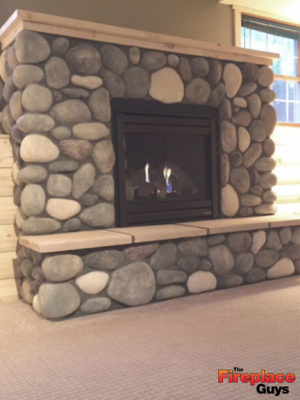 cabin living boulder fireplace