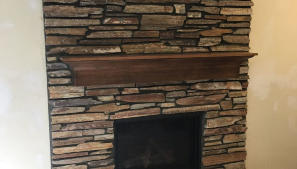 large limestone hearth fireplace installation mn