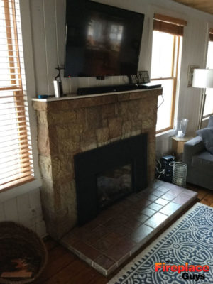 modern rustic fireplace before barnwood mantel